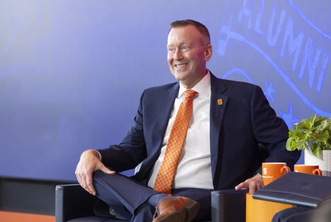 Chancellor Mike Haynie sitting and smiling.