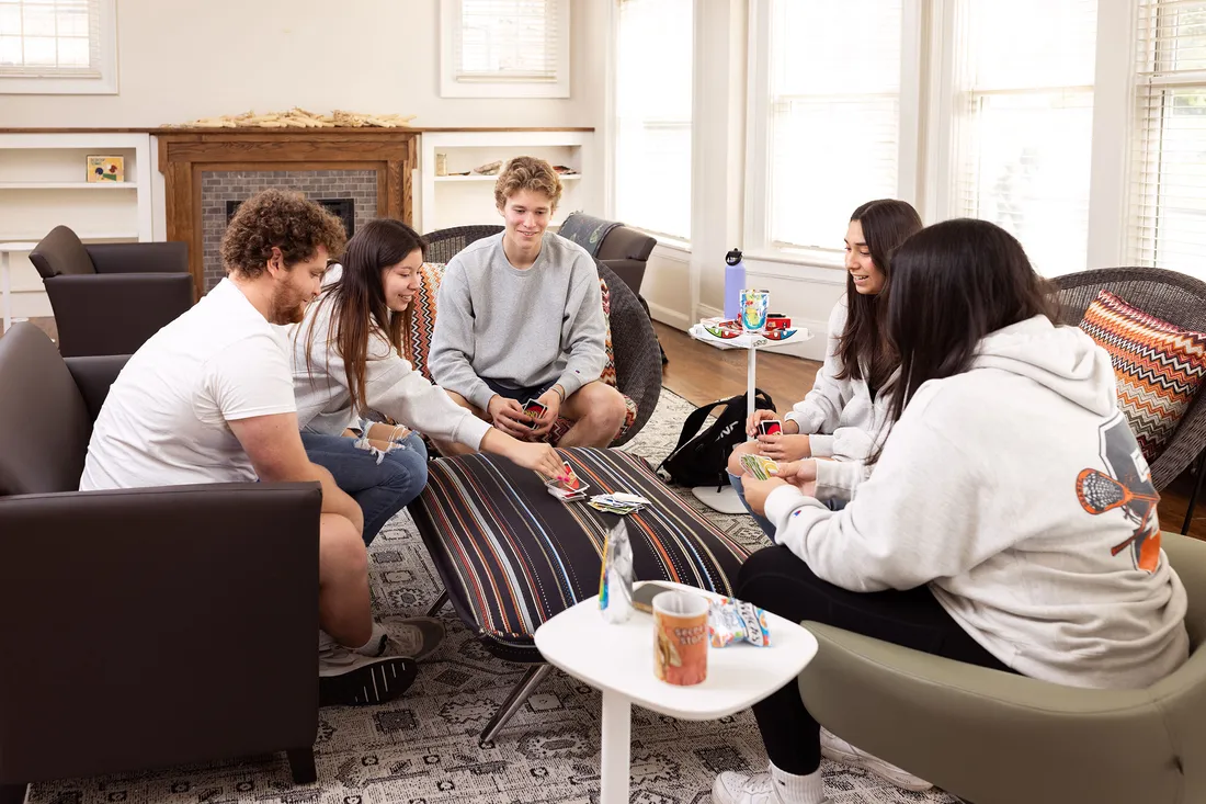 Students in 113 Euclid playing cards