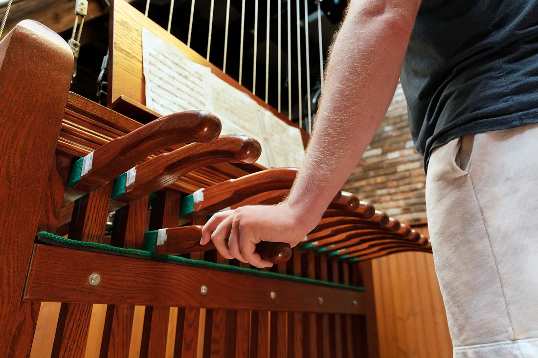 Hands on chimes in Crouse College