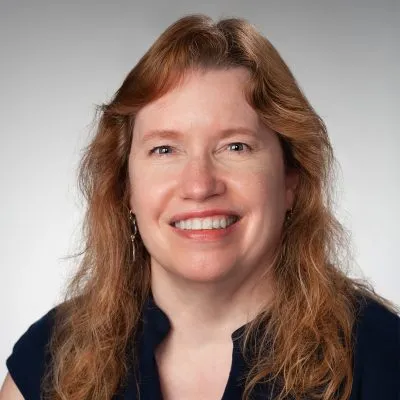 Allison Vincent smiling in a black shirt.