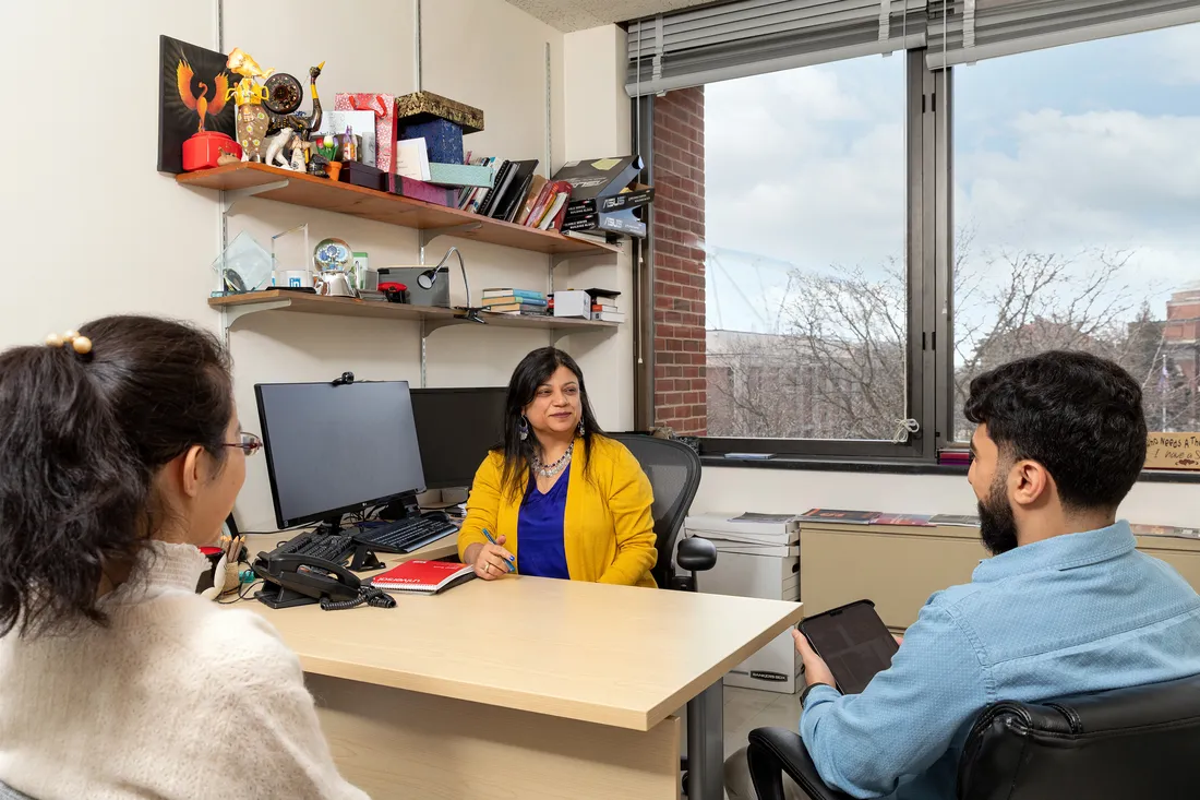 Shikha Nangia talking with students.