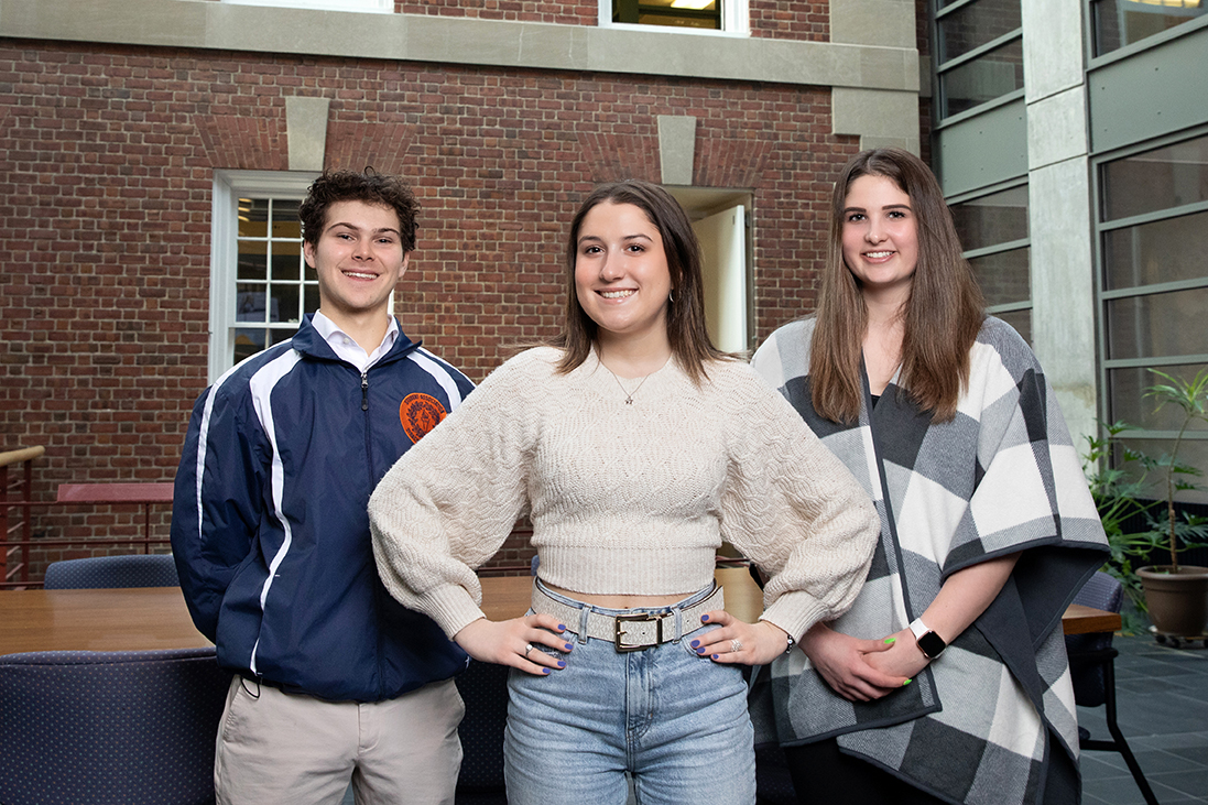 Aden Solomon, Jenna Poma, and Taylor Grosso in the Maxwell School of Citizenship and Public Affairs.