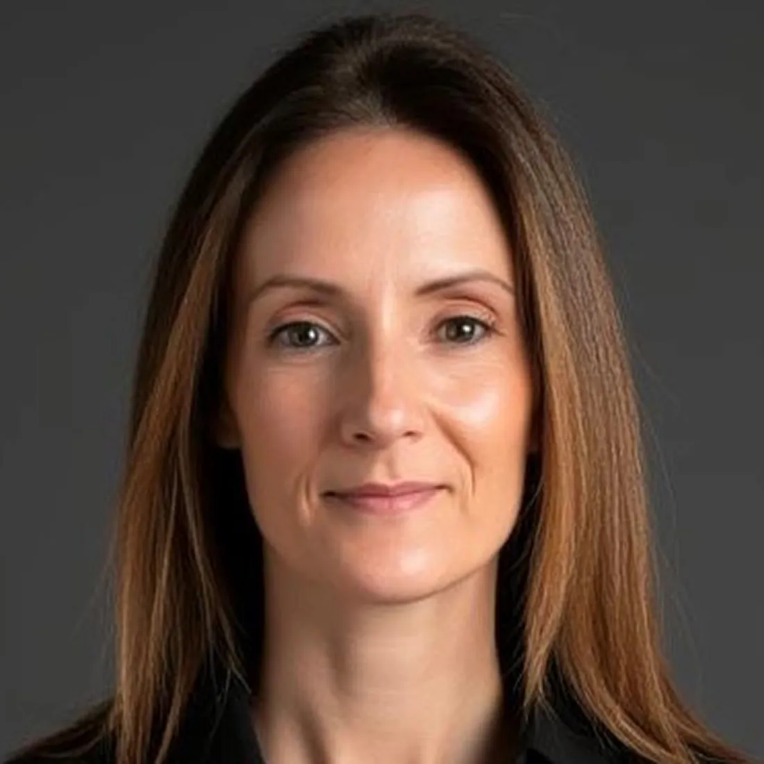 Karen Baris smiling.