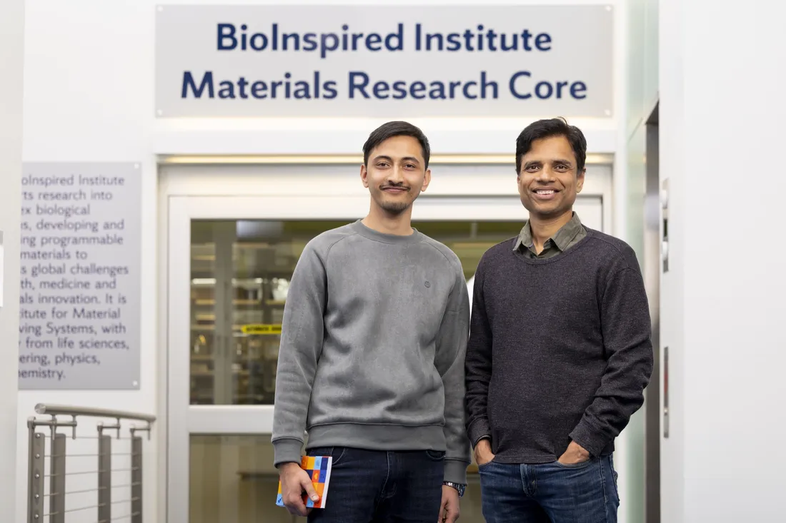 Sharad Timilsina and Pranav Soman standing together outside of the BioInspired Institute.