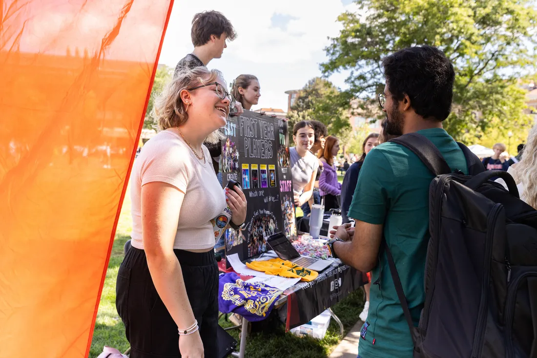 Syracuse students interacting at the 2023 Involvement Fair.