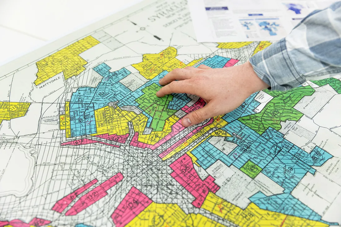 Hand hovering over a map