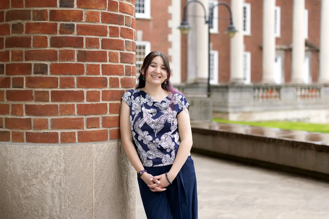 Valerie Goldstein outside a campus building.