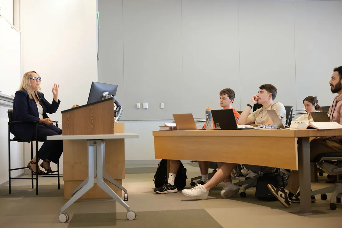 Kat MacFarlane in class teaching students.