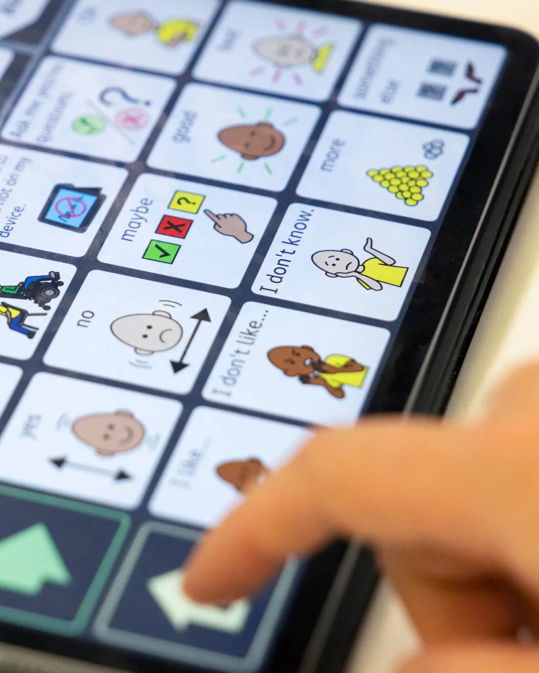 Close up of an augmentativeand alternative communication tool on a tablet device.