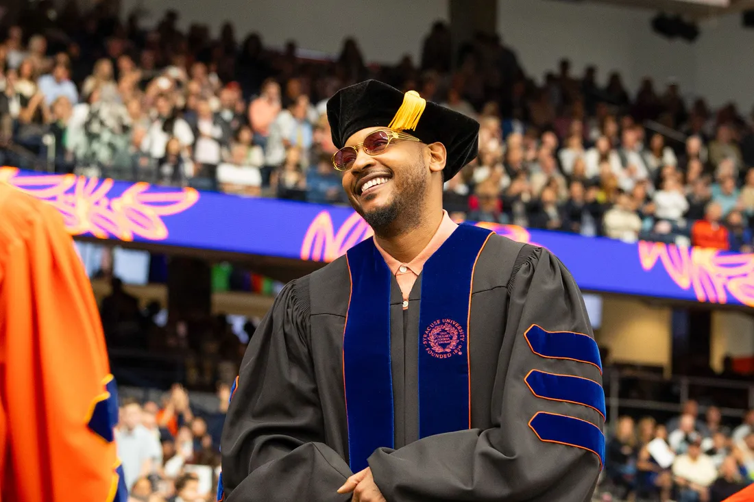 Carmelo Anthony giving a speech at commencement.