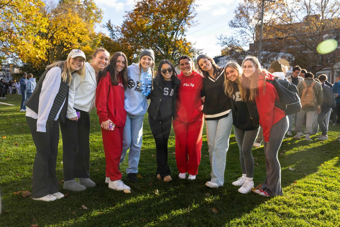 Greek life students pose for a group photo.