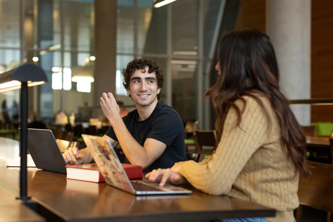 Law students sitting together in Dineen Hall.