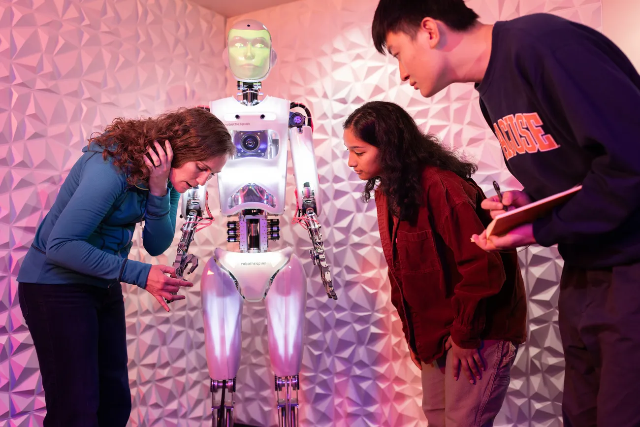 Students and professor in Robotics Link Lab