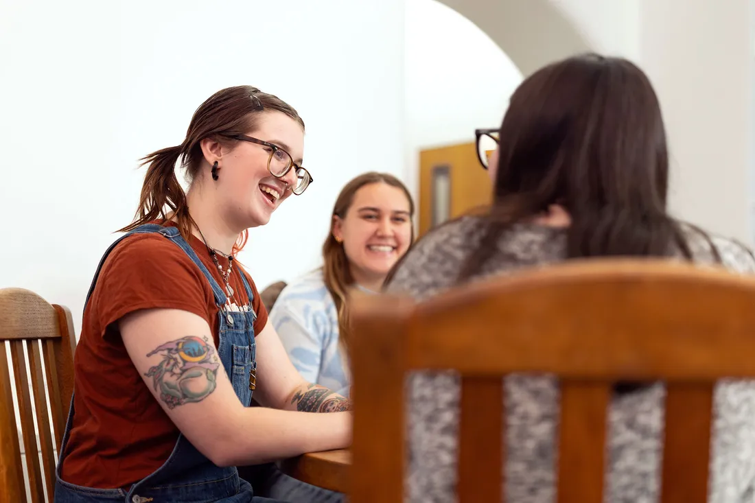 Students sitting at a table studying