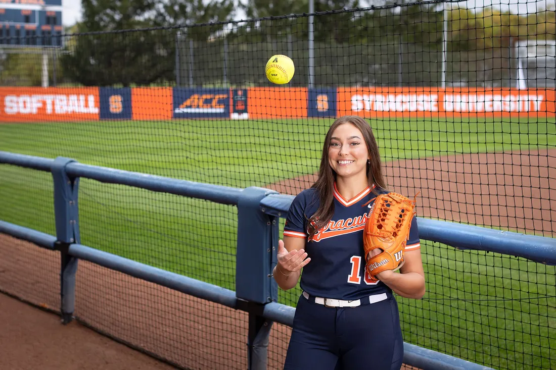 Pess in her softball uniform.