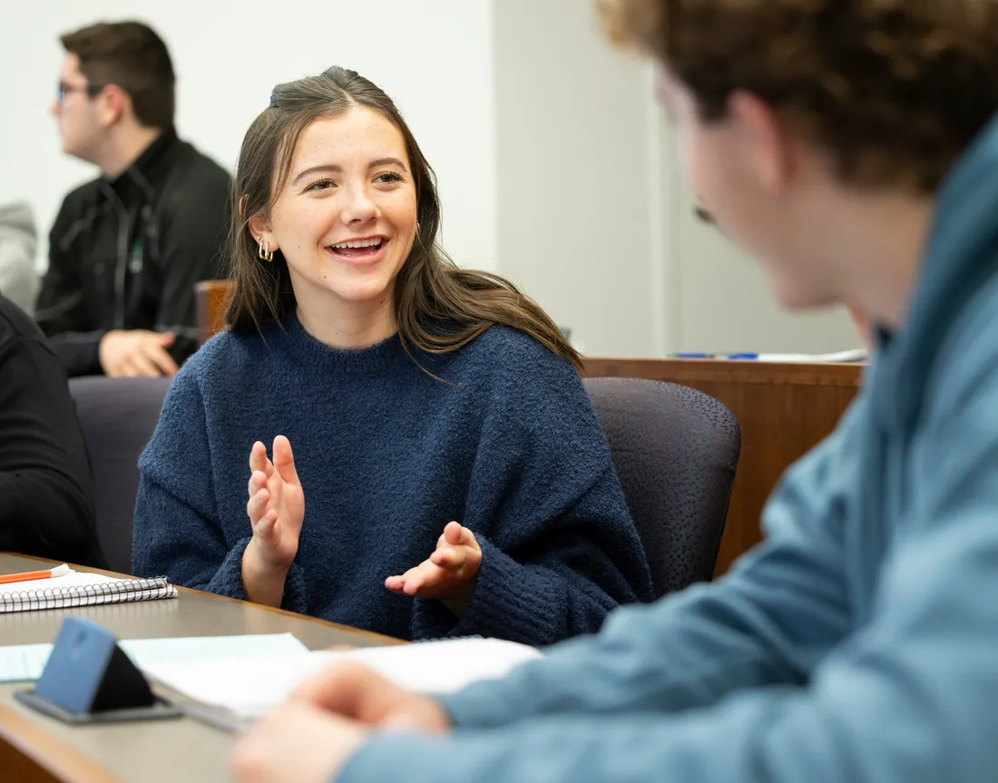 Student sitting in classroom.