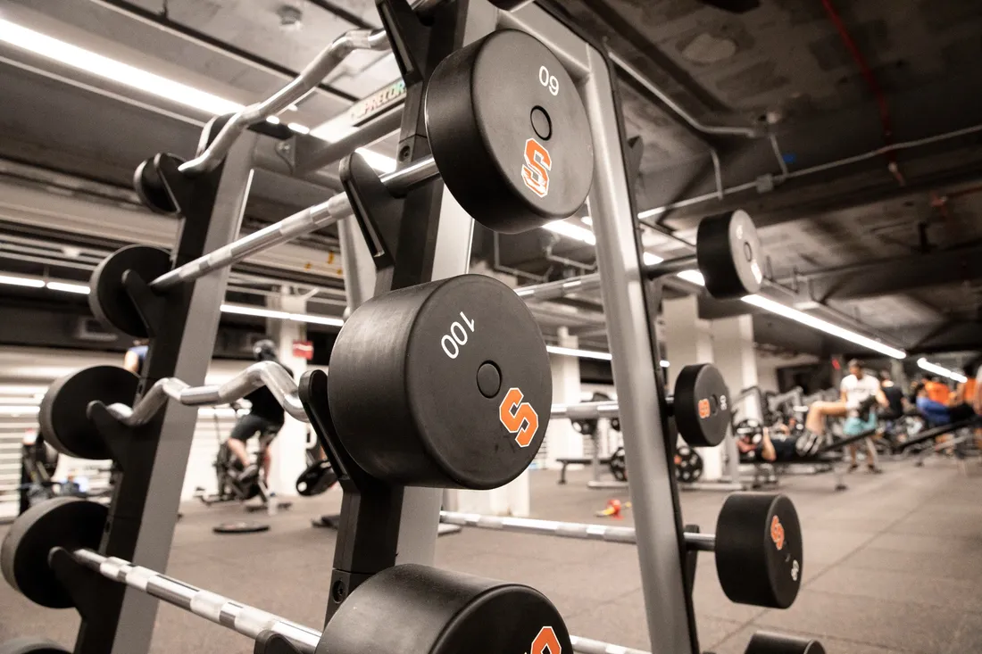 Barbells and other weigh training equipment.