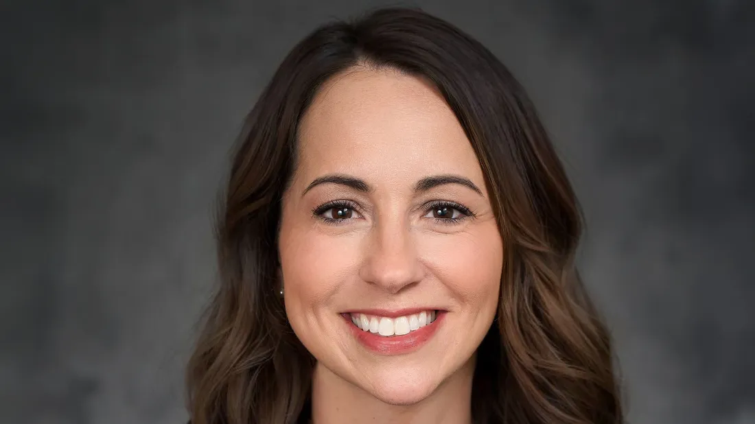 Nadine Flynn smiling.