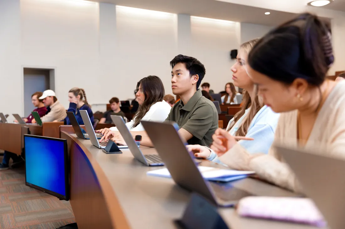 People in a lecture on Syracuse University's campus.