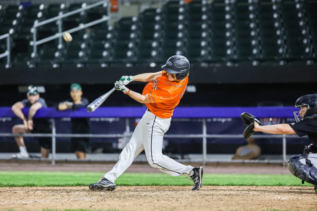 Student playing baseball.