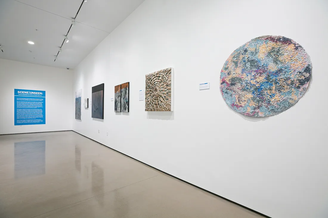 Art hanging in a gallery.