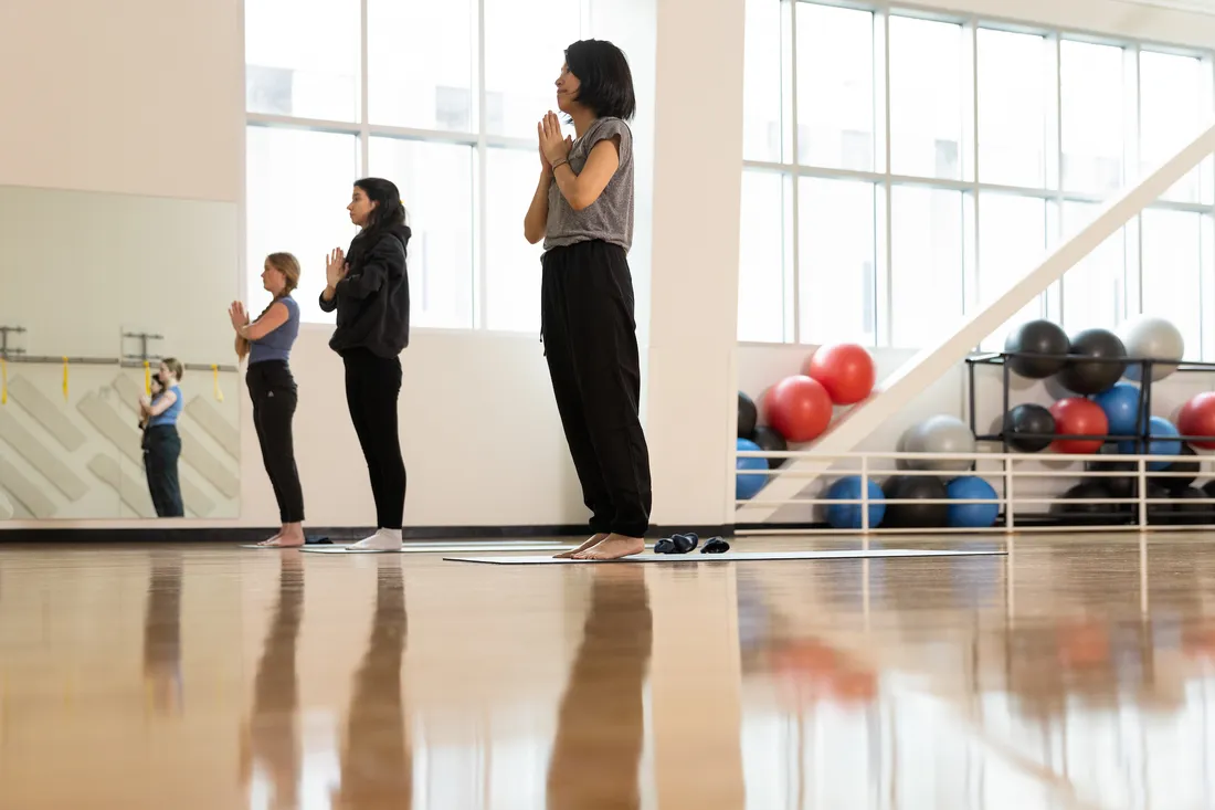 Students doing yoga.