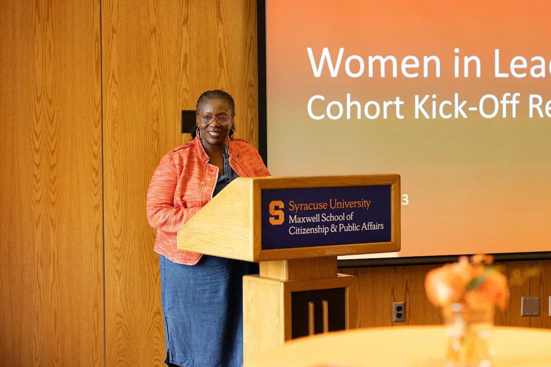 Candace Campbell Jackson stands at the lectern at a Women in Leadership Cohort Kick-Off event.