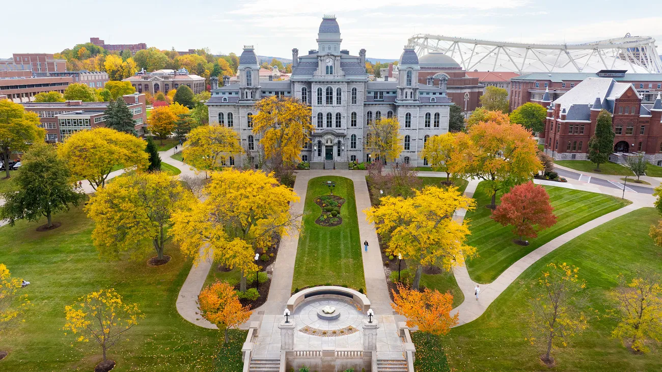 Overhead photo of campus features the Hall of Languages in the fall.