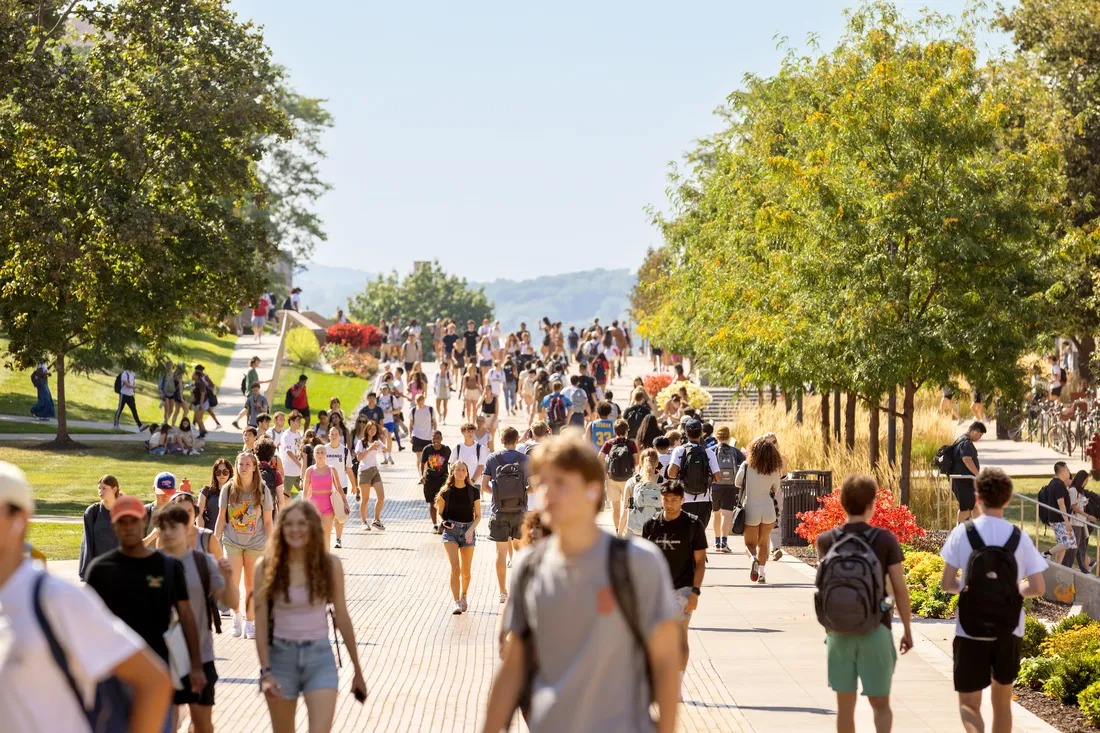 People walking on campus.