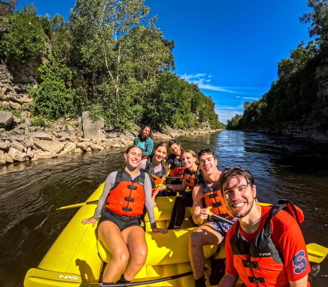 Students white water rafting.