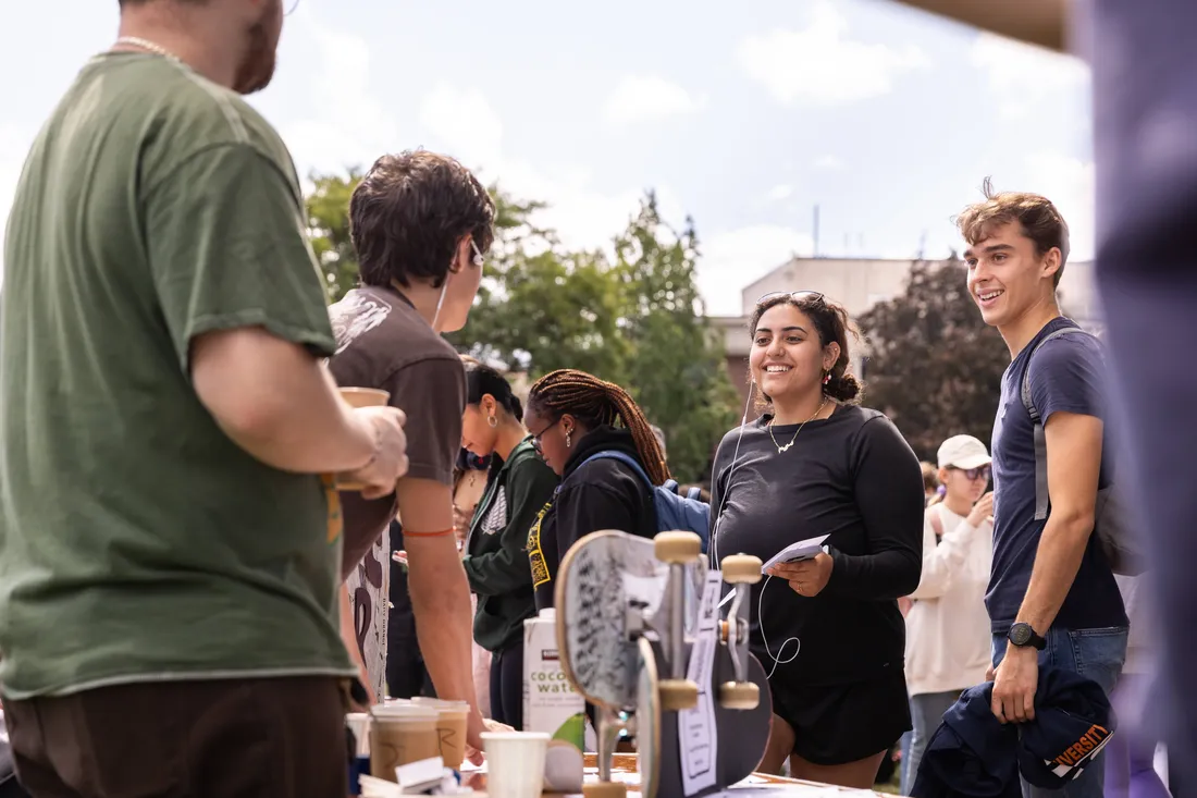 Students on campus at the student involvement fair.