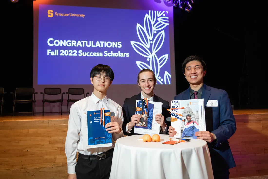 People winning an award at the 2023 Success Scholars.